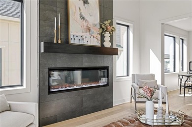 Discover modern, low-maintenance living in this stunning 1 on The Golf Club of Kansas in Kansas - for sale on GolfHomes.com, golf home, golf lot