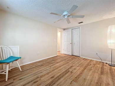 Lakefront Living in Beacon Woods Village with no flood insurance on Beacon Woods Golf Club in Florida - for sale on GolfHomes.com, golf home, golf lot