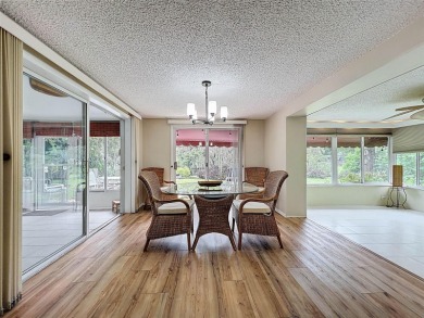 Lakefront Living in Beacon Woods Village with no flood insurance on Beacon Woods Golf Club in Florida - for sale on GolfHomes.com, golf home, golf lot