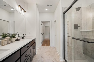 Discover modern, low-maintenance living in this stunning 1 on The Golf Club of Kansas in Kansas - for sale on GolfHomes.com, golf home, golf lot