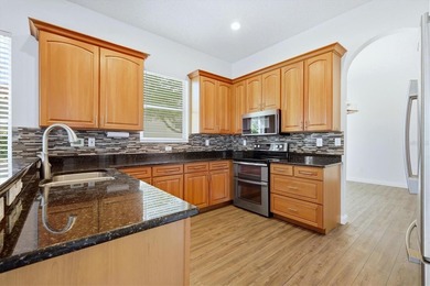 Welcome to 8876 Huntington Pointe Drive, a beautiful pool home on Stoneybrook Golf and Country Club of Sarasota in Florida - for sale on GolfHomes.com, golf home, golf lot