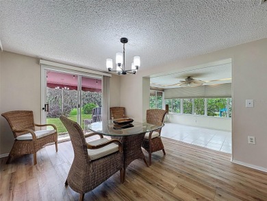 Lakefront Living in Beacon Woods Village with no flood insurance on Beacon Woods Golf Club in Florida - for sale on GolfHomes.com, golf home, golf lot