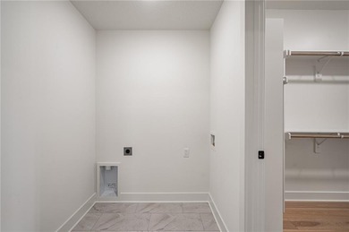 Discover modern, low-maintenance living in this stunning 1 on The Golf Club of Kansas in Kansas - for sale on GolfHomes.com, golf home, golf lot