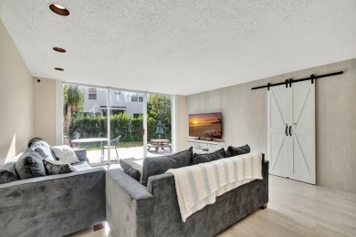 Welcome to this fantastic corner unit Townhouse in the on Fountains Golf and Country Club in Florida - for sale on GolfHomes.com, golf home, golf lot