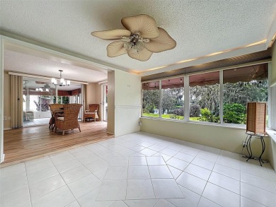 Lakefront Living in Beacon Woods Village with no flood insurance on Beacon Woods Golf Club in Florida - for sale on GolfHomes.com, golf home, golf lot