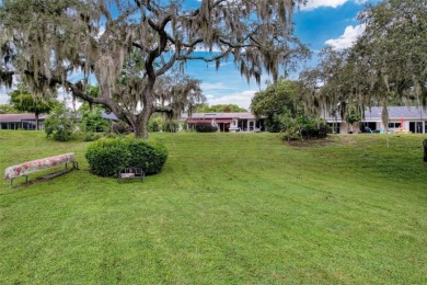 Lakefront Living in Beacon Woods Village with no flood insurance on Beacon Woods Golf Club in Florida - for sale on GolfHomes.com, golf home, golf lot