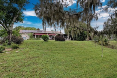 Lakefront Living in Beacon Woods Village with no flood insurance on Beacon Woods Golf Club in Florida - for sale on GolfHomes.com, golf home, golf lot