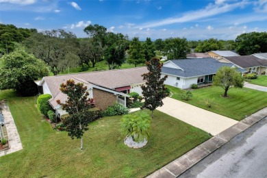 Lakefront Living in Beacon Woods Village with no flood insurance on Beacon Woods Golf Club in Florida - for sale on GolfHomes.com, golf home, golf lot