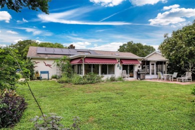 Lakefront Living in Beacon Woods Village with no flood insurance on Beacon Woods Golf Club in Florida - for sale on GolfHomes.com, golf home, golf lot