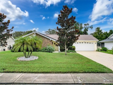 Lakefront Living in Beacon Woods Village with no flood insurance on Beacon Woods Golf Club in Florida - for sale on GolfHomes.com, golf home, golf lot