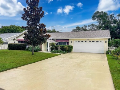 Lakefront Living in Beacon Woods Village with no flood insurance on Beacon Woods Golf Club in Florida - for sale on GolfHomes.com, golf home, golf lot