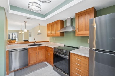 Step into comfort and style with this beautifully updated on East Lake Woodlands Country Club in Florida - for sale on GolfHomes.com, golf home, golf lot
