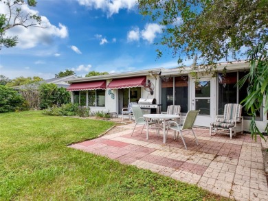 Lakefront Living in Beacon Woods Village with no flood insurance on Beacon Woods Golf Club in Florida - for sale on GolfHomes.com, golf home, golf lot