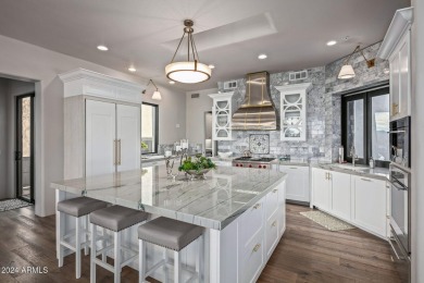 Welcome to 411 Eagle Feather, a beautifully updated custom home on Desert Mountain Golf Club - Renegade Course in Arizona - for sale on GolfHomes.com, golf home, golf lot