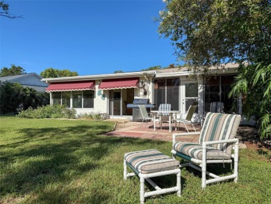 Lakefront Living in Beacon Woods Village with no flood insurance on Beacon Woods Golf Club in Florida - for sale on GolfHomes.com, golf home, golf lot