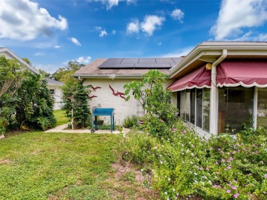Lakefront Living in Beacon Woods Village with no flood insurance on Beacon Woods Golf Club in Florida - for sale on GolfHomes.com, golf home, golf lot