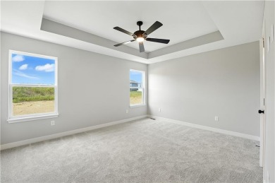 Welcome to this charming 4-bedroom, 3.5-bathroom two-story home on Golf Club of Creekmoor in Missouri - for sale on GolfHomes.com, golf home, golf lot