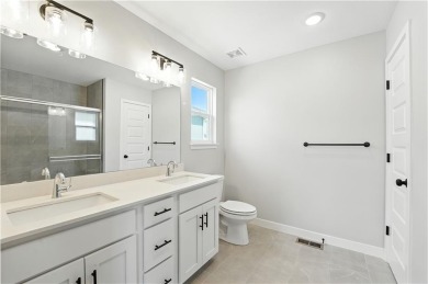 Welcome to this charming 4-bedroom, 3.5-bathroom two-story home on Golf Club of Creekmoor in Missouri - for sale on GolfHomes.com, golf home, golf lot