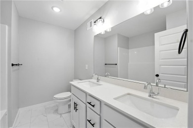 Welcome to this charming 4-bedroom, 3.5-bathroom two-story home on Golf Club of Creekmoor in Missouri - for sale on GolfHomes.com, golf home, golf lot