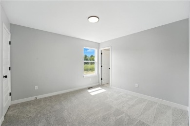 Welcome to this charming 4-bedroom, 3.5-bathroom two-story home on Golf Club of Creekmoor in Missouri - for sale on GolfHomes.com, golf home, golf lot