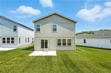 Welcome to this charming 4-bedroom, 3.5-bathroom two-story home on Golf Club of Creekmoor in Missouri - for sale on GolfHomes.com, golf home, golf lot
