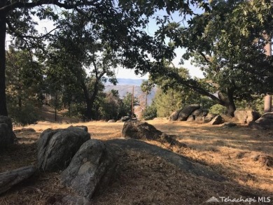 Very buildable lot on a quiet cul de sac with rock formations on Oak Tree Country Club in California - for sale on GolfHomes.com, golf home, golf lot