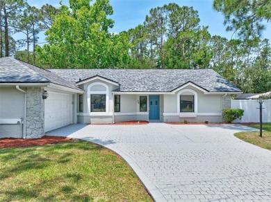 Light-Filled Designer Pool Home | New Roof | Gourmet Kitchen | on The Grand Club - Pine Lakes Course in Florida - for sale on GolfHomes.com, golf home, golf lot