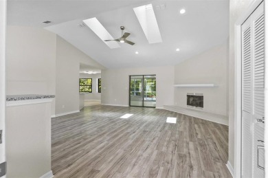 Light-Filled Designer Pool Home | New Roof | Gourmet Kitchen | on The Grand Club - Pine Lakes Course in Florida - for sale on GolfHomes.com, golf home, golf lot