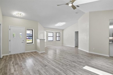 Light-Filled Designer Pool Home | New Roof | Gourmet Kitchen | on The Grand Club - Pine Lakes Course in Florida - for sale on GolfHomes.com, golf home, golf lot