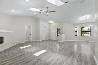 Light-Filled Designer Pool Home | New Roof | Gourmet Kitchen | on The Grand Club - Pine Lakes Course in Florida - for sale on GolfHomes.com, golf home, golf lot