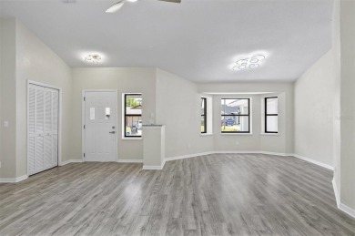 Light-Filled Designer Pool Home | New Roof | Gourmet Kitchen | on The Grand Club - Pine Lakes Course in Florida - for sale on GolfHomes.com, golf home, golf lot