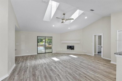 Light-Filled Designer Pool Home | New Roof | Gourmet Kitchen | on The Grand Club - Pine Lakes Course in Florida - for sale on GolfHomes.com, golf home, golf lot
