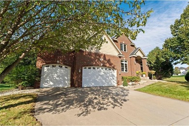 Set along the 14th hole in The Wilds, this executive two-story on The Wilds Golf Club in Minnesota - for sale on GolfHomes.com, golf home, golf lot