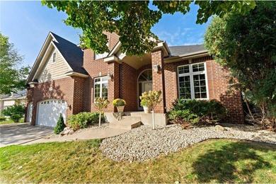 Set along the 14th hole in The Wilds, this executive two-story on The Wilds Golf Club in Minnesota - for sale on GolfHomes.com, golf home, golf lot