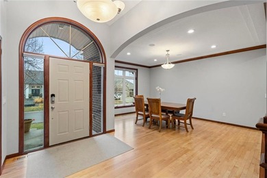 Set along the 14th hole in The Wilds, this executive two-story on The Wilds Golf Club in Minnesota - for sale on GolfHomes.com, golf home, golf lot