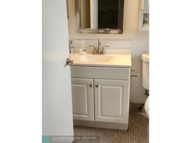 Beautiful Corner unit, nicely updated with direct golf course on  in Florida - for sale on GolfHomes.com, golf home, golf lot