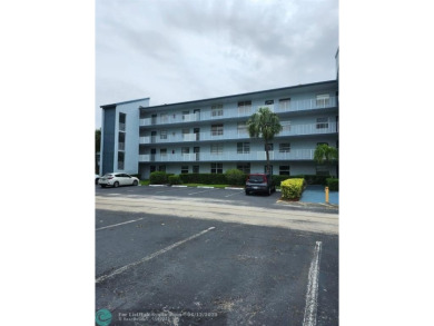 Beautiful Corner unit, nicely updated with direct golf course on  in Florida - for sale on GolfHomes.com, golf home, golf lot