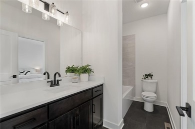 Discover modern, low-maintenance luxury living in this stunning on The Golf Club of Kansas in Kansas - for sale on GolfHomes.com, golf home, golf lot