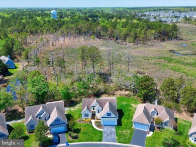 Elegant Coastal Living in Bethany Bay Discover timeless coastal on Bethany Bay Golf Club in Delaware - for sale on GolfHomes.com, golf home, golf lot