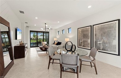 This exquisite Hallmark Home featuring 3 spacious bedrooms, 2 on Valencia Golf and Country Club in Florida - for sale on GolfHomes.com, golf home, golf lot