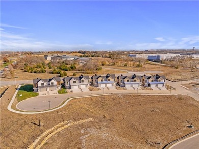 Discover modern, low-maintenance luxury living in this stunning on The Golf Club of Kansas in Kansas - for sale on GolfHomes.com, golf home, golf lot