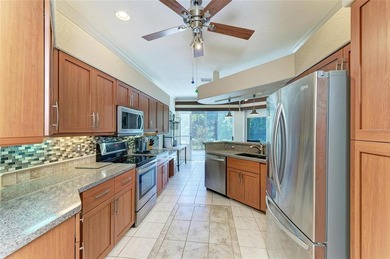 Located in the gated community of Seminole Lakes, home to the on Seminole Lakes Country Club in Florida - for sale on GolfHomes.com, golf home, golf lot