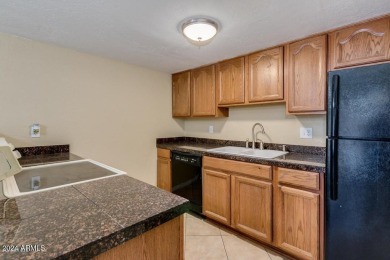 Fabulous 2-story townhome with 2 bedrooms, 1.5 baths. Kitchen on Raven Golf Club At South Mountain in Arizona - for sale on GolfHomes.com, golf home, golf lot