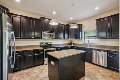 Step into your new home in Summerfield Crossings, a on Summerfield Crossing Golf Club in Florida - for sale on GolfHomes.com, golf home, golf lot