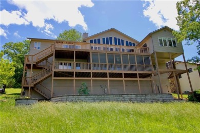 Welcome to your dream home in the heart of the Ozarks! Nestled on Holiday Island Executive Golf Course in Arkansas - for sale on GolfHomes.com, golf home, golf lot