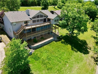 Welcome to your dream home in the heart of the Ozarks! Nestled on Holiday Island Executive Golf Course in Arkansas - for sale on GolfHomes.com, golf home, golf lot