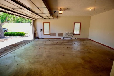 Welcome to your dream home in the heart of the Ozarks! Nestled on Holiday Island Executive Golf Course in Arkansas - for sale on GolfHomes.com, golf home, golf lot