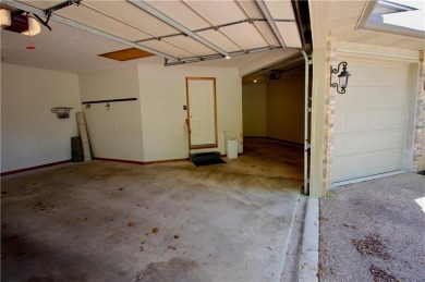 Welcome to your dream home in the heart of the Ozarks! Nestled on Holiday Island Executive Golf Course in Arkansas - for sale on GolfHomes.com, golf home, golf lot