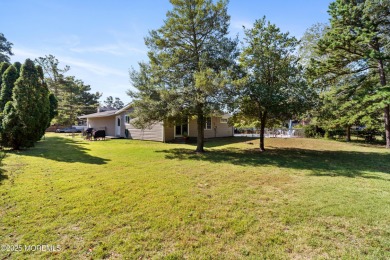 This charming 3-bedroom, 2-bathroom home is perfectly situated on Ocean County Golf Course At Atlantis in New Jersey - for sale on GolfHomes.com, golf home, golf lot