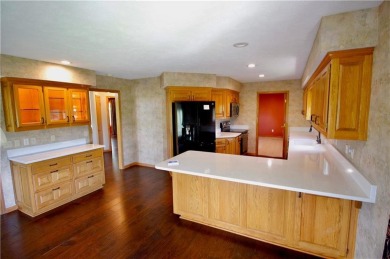 Welcome to your dream home in the heart of the Ozarks! Nestled on Holiday Island Executive Golf Course in Arkansas - for sale on GolfHomes.com, golf home, golf lot